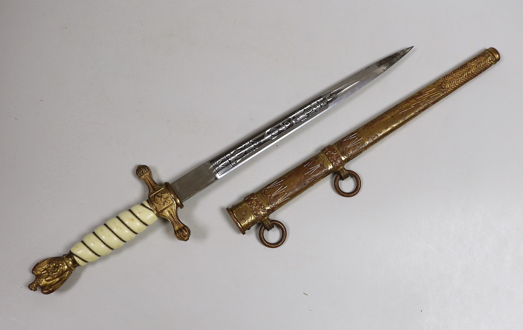 A German Third Reich Kriegsmarine Officer’s Dagger and sheath by Eickhorn, Solingen. Total length 42.5cm